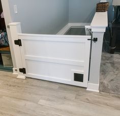 a dog house built into the side of a wall next to a carpeted floor