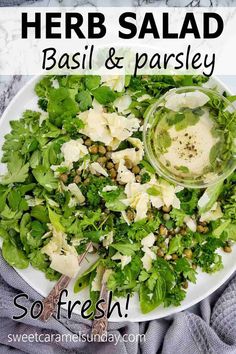 a white plate topped with salad and dressing