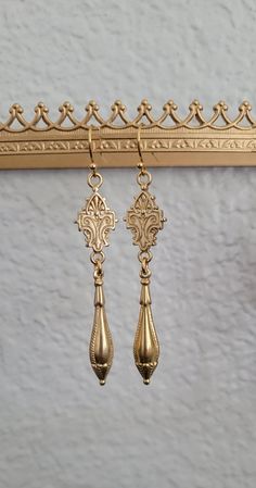 Adorn yourself with these stunning gold dipped brass  earrings with  beautifully detailed metalwork. * The  back of these earrings are the exact same as the front side. These earrings are 2.5 "inches long.  Lightweight    *All my jewelry is free of lead, free of nickel .Eco friendly metals .    * All materials sourced from The USA, Italy, Spain , Portugal and The United Kingdom.    * All my jewelry is designed for you to express yourself and your life with happiness , beauty and spirit. Hourglass Earrings, Bridgerton Art, Wedding Victorian, Fall Jewelry Trends, Spain Portugal, Edwardian Jewelry, Fall Jewelry, Gold Dipped, Ancient Rome