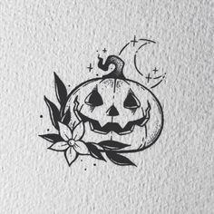 a black and white drawing of a jack o lantern