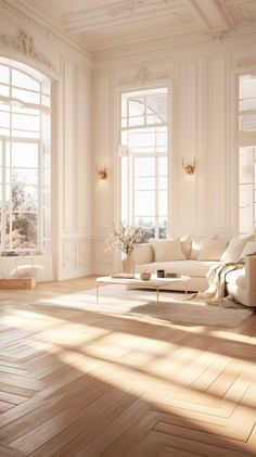 an empty living room with white furniture and large windows