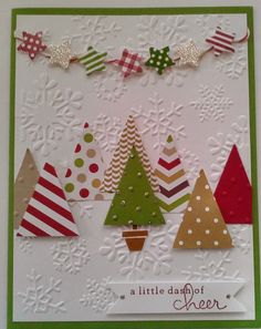 a card with christmas trees on it