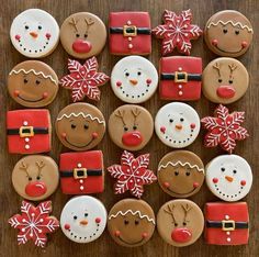 decorated cookies arranged in the shape of santas and snowmen