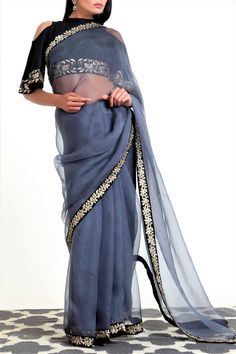 Being graceful is an asset and you can have your presence marked even in the simplest of simple outfit. Grey Saree, Black Color Combination, Saree Gown, Embroidered Organza, Desi Style, Organza Saree