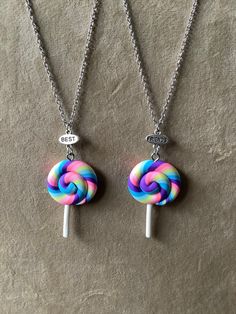 children's Best Friend lollipop necklaces set of two.  Polymer clay multicolour lollipops necklaces with best friend charms and  stainless steel cable chains and clasps.    A lovely gift for children to share with their best friend. Gift bags included  Chains are 16 inches long Playful Rainbow Charm Necklaces For Gifts, Playful Rainbow Charm Necklace For Gift, Playful Rainbow Charm Necklace As Gift, Fun Charm Necklaces With Lobster Clasp For Gifts, Fun Multicolor Jewelry For Best Friend Gift, Playful Nickel-free Charm Necklace For Gift, Playful Nickel-free Charm Necklaces For Gifts, Playful Personalized Polymer Clay Jewelry, Best Friend Charms