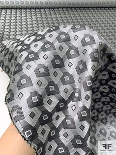 SKU: 16097 Content: 100% Silk Color: Grey / Black / Light Grey Width: 40 inches Grey Brocade Suit, Jacquard Brocade Fabric, Elegant Black Jacquard Fabric, Black Jacquard Fabric, Silk Necktie, Black Light, Fabric Gifts, Neck Tie, Quality Fabric