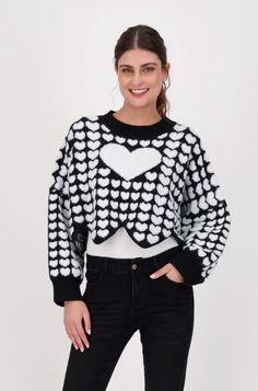 Cropped and comfy, this classic black and white sweater is filled with love. Heart pattern throughout and waved edging makes this unique piece stand out. Soft and ready for chilly season. Cozy Black Jacquard Knit Sweater, White Heart Sweater For Winter, White Heart Print Sweater For Winter, White Casual Sweater With Heart Print, Casual White Sweater With Heart Print, Casual White Heart Print Sweater, White Trendy Sweater With Heart Print, Trendy White Sweater With Heart Print, Black And White Sweater