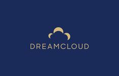 the word dream cloud is written in gold on a dark blue background with an image of clouds