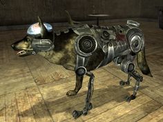 a dog dressed up like a robot standing on top of a wooden floor