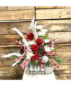 Sleigh Ride, Silk Sleigh Ride Arrangement, Silk Christmas Arrangement, Silk Flowers, Artificial Flowers, Country Sleigh Ride, Sleigh,  Ruby red roses and carnations are accented with burgundy safari sunset and berries.  Adorned with natural pinecones and country themed ribbon with a keepsake metal sleigh. Roses And Carnations, Safari Sunset, Holiday Floral Arrangements, Holiday Floral, Christmas Arrangements, Sleigh Ride, Local Florist, Holiday Gift Guide, Ruby Red