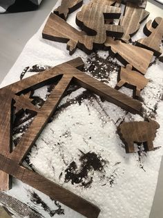 several pieces of wood sitting on top of a table