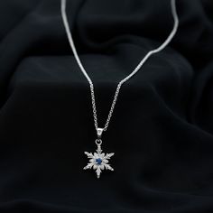 Product Details Adorn her look with this stunning Designer Snowflake Pendant. Embellished with a cluster of Round Shape Blue Sapphire and Round Shape Diamond stones in a prong setting, this Snowflake Pendant Necklace making it a luxurious choice for special occasions. Product Information SKU SHP-PENDANT012148209 Weight 3.80 gm (Approximate) BLUE SAPPHIRE INFORMATION No.of Stones 1 Pieces Total Weight 0.18 Carat (Approximate) Dimension(approx) Round-3X3 mm-1 Pcs Color Blue Cut Brilliant Shape Rou Snowflake Pendant, Diamond Stone, Round Cut Diamond, Blue Stone, Prong Setting, Blue Sapphire, Sapphire, Yellow Gold, White Gold