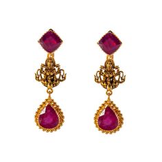 Virani Jewelers presents a gorgeous temple-style 22k gold necklace and earring set, a harmonious blend of tradition and sophistication. The intricate temple design, complemented by the warm glow of 22k gold, accentuates the allure of elegant rubies. Adorn yourself in this Indian gold necklace and earring set, a timeless expression of refined taste and cultural richness. Features • 22k yellow gold • Ruby Necklace Specifications: • Minimum Width - 3 millimeter • Maximum Width - 21 millimeters • Le 22k Gold Dual-tone Temple Jewelry, Yellow Gold Chandbali Temple Necklace, Ruby Temple Necklace, Elegant 22k Gold Temple Necklace For Puja, Festive Ruby Temple Necklace For Diwali, Gold Ruby Temple Necklace, Ruby Temple Jewelry Jhumkas For Festive Occasions, Gold Plated Temple Jewelry Jhumkas For Puja, Ruby Latkans Temple Jewelry