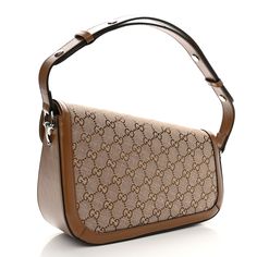 This is an authentic GUCCI Monogram Small Horsebit 1955 Asymmetric Shoulder Bag in Beige Brown Sugar. This stylish shoulder bag is crafted of Gucci GG monogram fabric. The bag features a front flap with a silver horse-bit detail, and adjustable leather handle. The bag opens to a beige fabric interior with a zipper pocket. Gg Monogram, Silver Horse, Gucci Monogram, Horse Bits, Stylish Shoulder Bag, Beige Fabric, Beige Brown, Leather Handle, Brown Sugar