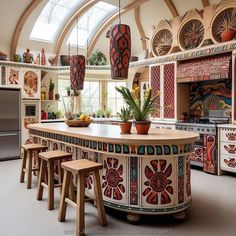 a large kitchen with an island in the middle and lots of decorations on the walls