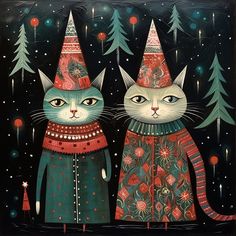 two cats wearing christmas hats and sweaters