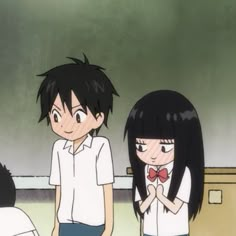 two anime characters standing next to each other