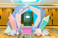 an entrance to a building decorated with geometric shapes and the words platboy on it