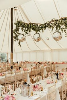 Marquee wedding reception with disco ball decor with greenery/foliage and pink colour palette including pink flower arrangement and stationery with maneki-neko favours Wedding Decorations Marquee, Christmas Marquee Decoration, Marquee Wedding Decor, Marquee Decoration Birthday, Garden Wedding Marquee, Marque Wedding, Disco Tent Wedding, Wedding Reception Marquee, Marquee Birthday