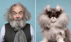 an old man with grey hair and beard next to a cat wearing a black vest