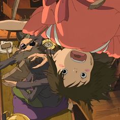 an anime scene with two people and some animals on the ground, one is upside down