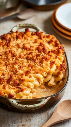 a casserole dish with macaroni and cheese in it on a table