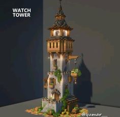 the tower is made out of legos and has plants growing on its sides,