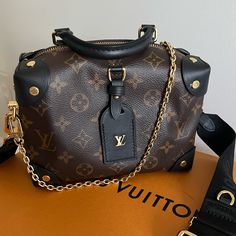 Elevate Your Fashion Game With This Stunning Louis Vuitton Petite Malle Souple Monogram Bag. Crafted With Premium Leather, This Crossbody Bag Is Perfect For Women Who Appreciate Style And Functionality. Its Monogram Pattern Adds A Touch Of Elegance That Complements Any Outfit, While The Brown Exterior Color Exudes Sophistication. This Designer Bag Is A Must-Have For Fashion Enthusiasts Who Want To Make A Statement. With Its Spacious Interior, It Can Easily Hold All Your Essentials While Keeping Louis Vuitton Petite Malle, Louis Vuitton Handbags Outlet, Monogram Pattern, Handbag Outlet, Monogram Bag, Designer Bag, Vuitton Bag, Louis Vuitton Handbags, Fashion Games