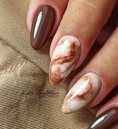 Immerse yourself in the fall vibes with elegant nail designs that convey the enchantment of the season. Embellish your nails in style. Nail Art On Brown Nails, Acrylic Brown Nail Designs, Simple Earthy Nail Designs, Brown Nail Arts, Nail Art For Dark Hands, Best Autumn Nails, Brown Fall Nails 2022, Brown Nails With White Design, Nail Art Brown Aesthetic