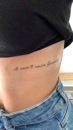 Small Tattoos For Side Ribs, Elegant Side Tattoos For Women, Encouraging Word Tattoos, Cute Tattoos On Side Ribs, Rib Tattoos For Women Quotes Inspirational, Words Rib Tattoo, Tattoo Ideas Recovery, Rib Writing Tattoos For Women, Rib Tattoo Ideas Women