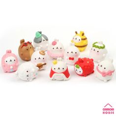 a group of small toy animals sitting next to each other