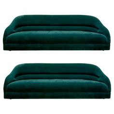 two green couches sitting next to each other