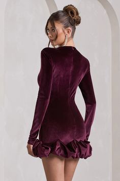 Opt for opulence at your next social event in our port mini dress. Claudine. Crafted in our signature stretch velvet. this long-sleeved bodycon is characterised by an extravagant display of ruffles along its hemline. Keep Claudine at the forefront during your next birthday soiree by pairing it with a sleek bun and gold accents. Features - Premium stretch velvet- Bodycon fit - Crew neckline - Padded shoulders- Long sleeves- Invisible zip closure - Ruffled hemline - Mini length Sizing & Fit Model is 5'7" and wears US size 4 / UK size 8 Product Information Designed exclusively by Club L London Fully lined with good stretch Premium velvet in Port (92% Polyester. 8% Elastane) 85cm total length SKU: CL128798101 Birthday Soiree, Ruffled Mini Dress, Club L London, Sleek Bun, Social Event, Ruffle Mini Dress, High Neck Long Sleeve, Satin Mini Dress, Invisible Zip