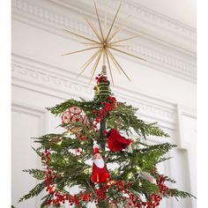 a christmas tree decorated with ornaments and lights