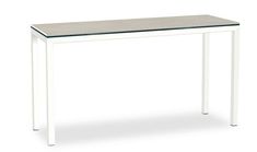 a white table with a glass top and metal legs, on an isolated white background