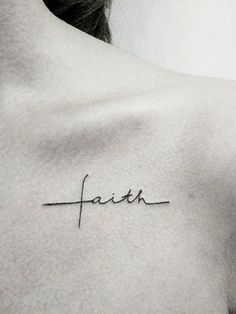 a woman's chest with the word faith written in cursive font on it