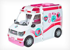 the toy truck is white with pink trims and features heart shaped stickers on the side