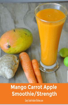 carrots, ginger, lemon and juice on a wooden table with fruits and vegetables