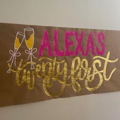 a sign that says, alex's vineyard rest with two glasses of wine on it