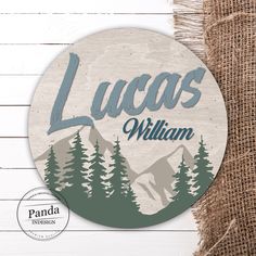 a wooden sign with the name lucas william on it