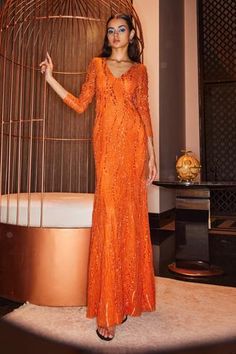 Shop for House of Eda Orange Polyester Milla Embellished Gown for Women Online at Aza Fashions Festive Maxi Length Sequin Dress For Gala, Festive Sequin Maxi Dress For Gala, Festive Floor-length Sequin Dress For Formal Events, Festive Floor-length Sequin Dress, Festive Floor-length Sequin Dress For Party Season, Sequin Dress For Party Season Reception, Elegant Floor-length Sequin Dress For Festive Occasions, Sequin Dress For Reception And Party Season, Festive Formal Sequin Dress