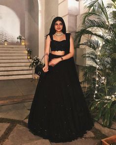 Elevate your style with this stunning Party Wear Lehenga Choli! Designed with intricate details, this black Georgette Lehenga is perfect for weddings and special occasions. Get ready to turn heads and feel confident in this designer outfit by best_one_1990. Don't miss out on this opportunity to add a touch of elegance to your wardrobe. #IndianOutfits #WeddingLehenga #DesignerLehenga #WomenFashion #BestOne1990 #LehengaCholi #BlackLehenga #Unstitched #Fashionista👑 #Lehenga #India #Choli #Black Graduation Traditional Outfits, Lehenga Outfits Simple, Simple Wedding Outfits Indian, Photoshoot Ideas In Lehenga, Stitched Lehenga Ideas, Graduation Outfit Ideas Indian, Black Desi Outfit, Lehenga Ideas Simple, Black Gown Indian