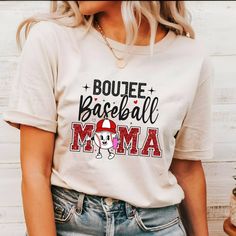 "Boujee Baseball Mama Shirt, Glitter Baseball Shirt, Baseball Mom Shirt, Gift for Mom, Sports Baseball Shirt, Baseball Mom Shirt, Baseball Gift, Our T-shirts are made from premium materials and printed using advanced technology to ensure exceptional quality and comfort. Features: Premium brand: Gildan Soft Style Professionally printed using advanced technology Unisex size for a comfortable fit Made from soft, breathable cotton for all-day comfort Durable construction to withstand repeated wear a Casual Crew Neck Tops With Glitter Print, Casual Cotton Tops With Glitter Print, Crew Neck Cotton Shirt With Glitter Print, Casual Short Sleeve Tops With Glitter Print, Cotton Crew Neck Shirt With Glitter Print, Sporty Crew Neck T-shirt With Glitter Print, Cotton Short Sleeve Tops With Glitter Print, White Casual Top With Glitter Print, Casual White Top With Glitter Print