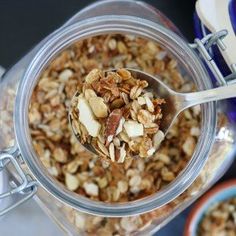 granola in a glass jar with a spoon