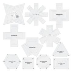 a bunch of white paper cut out into shapes