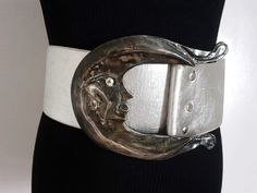 1980's Vintage LALOON Exclusive Design Silver Pewter Tone Metal With Clear Crystal Glass Eye Half Moon Face Buckle With Silver Colored  Faux Leather Strap Belt Size L XL Accessory It's Definitely a Statement Piece! Moon Buckle measurements: approx. 6" by 4-1/2" at the widest point and the Leather Strap Band Belt approx 38" end to end 3" wide fits size L XL Large. The  buckle is in very good condition and the belt strap is in fair condition there is some scratches and mark/spots/small ripped on t Moon Face, Glass Eyes, Design Silver, Half Moon, Belt Size, Clear Crystal, Crystal Glass, Belt Buckles, Leather Belt