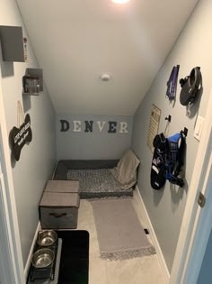 this is an image of a dog's room in the house with his bed