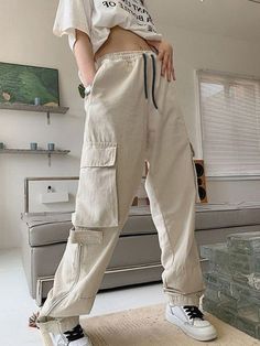 Style: Casual/Street/Punk/Vintage/Y2K/Hip PopFabric Content: CottonFit Type: Regular fitDescription: It's made from cotton fabric. sits to an adjustable tie waistline. features cargo style leg pockets. and has zip fly at ankles. ended with velcro... Beige Cargo Pants Women, Beige Cargo Pants, Streetwear Sweatpants, Beige Cargo, Street Punk, Women Cargo Pants, Punk Vintage, Baggy Trousers