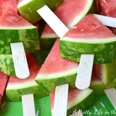 slices of watermelon and popsicles with toothpicks