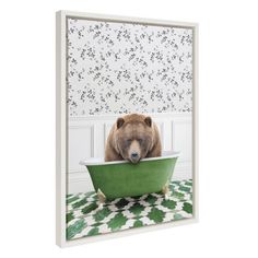 a brown bear sitting in a green bathtub with its head resting on the edge